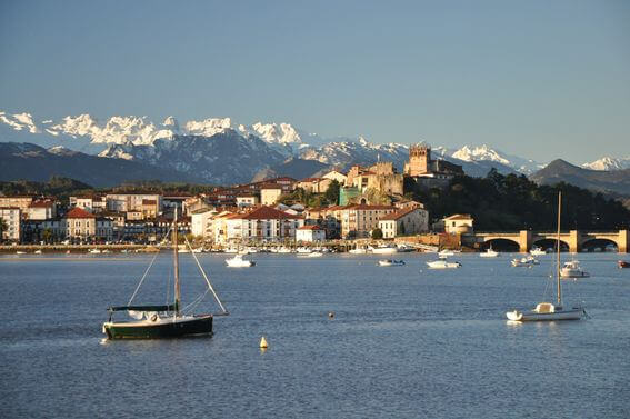 The green coast of North Spain, Crystal clean ocean and wild mountain range of Picos de Europa