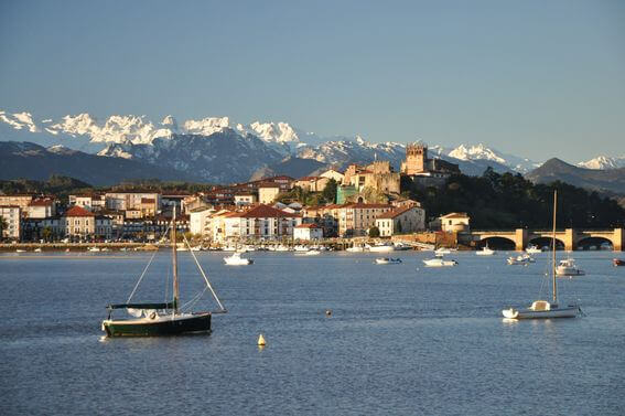 The green coast of North Spain, Crystal clean ocean and wild mountain range of Picos de Europa